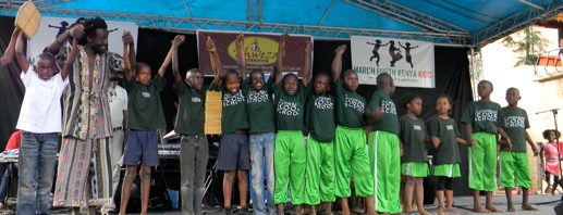 Assistant Director of Programs Charles Obuya with the March Forth Kenya Kids Students after their 2011 performance