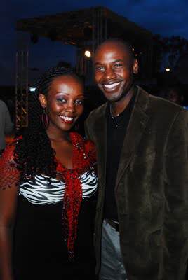 LindaMuthamaposeswithComedianNyambanea.k.aWalterMongarebeforetheshow.jpg