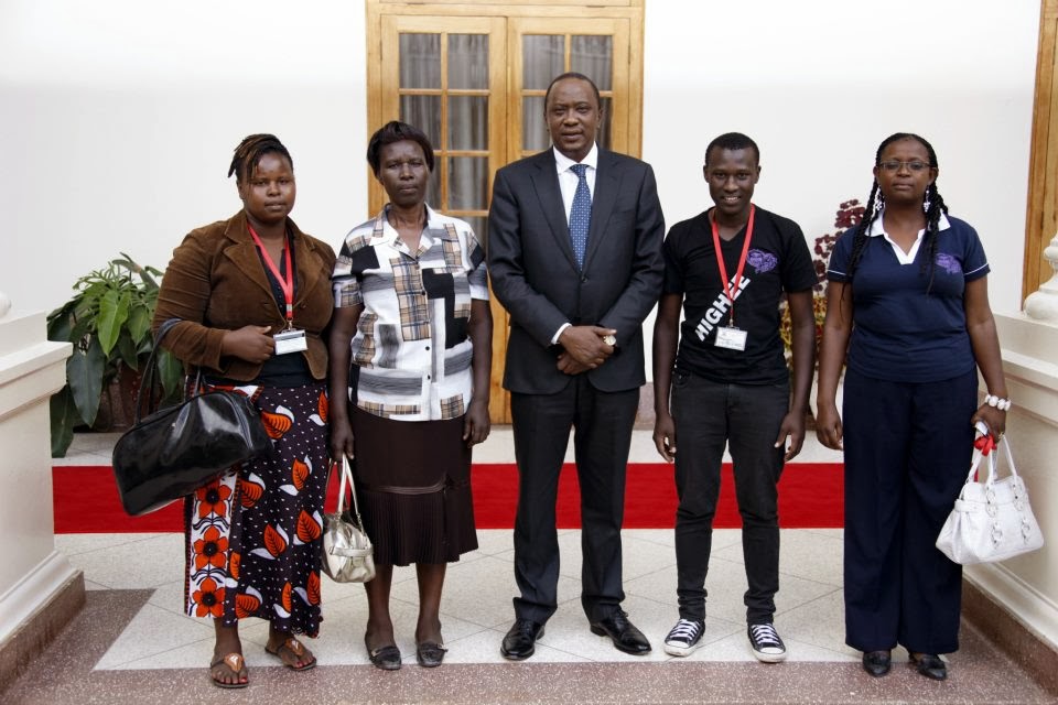President_Kenyatta_and_otonglo_boy_family.jpg