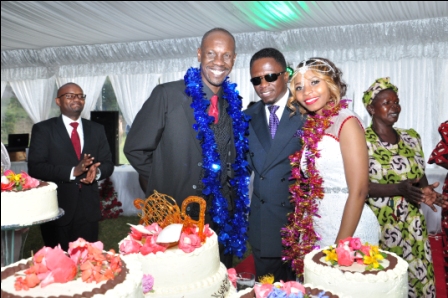 hon_ababu_namambwa_with_bride_and_groom.JPG