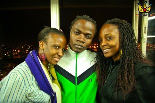 juliani flanked by fans