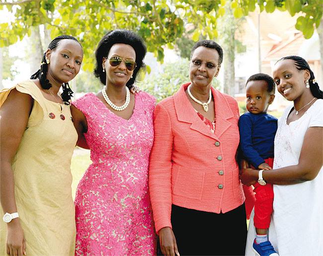First Lady Janet Museveni with her daughters and grandchild