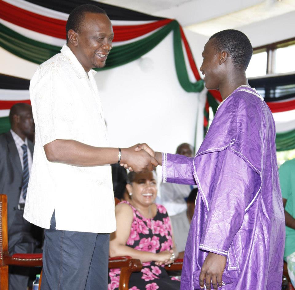 President Uhuru Kenyatta and his adopted son Daniel Owira