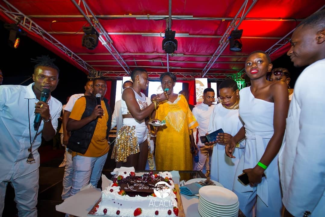 Akothee feeds her mother cake after the performance in Kisumu