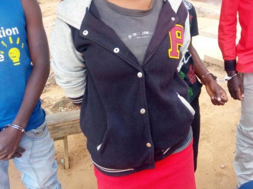 The missing girl with the three boys after they were arrested