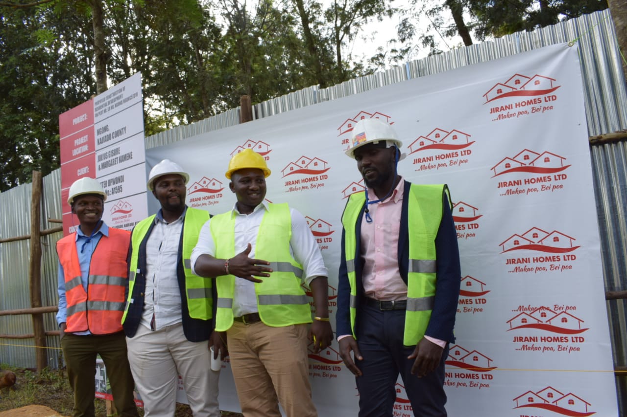 Kennedy Murithi and Kevin Njuguna (second and third from right) the founders of Jirani Homes