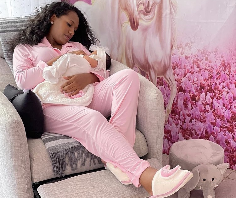 Grace Ekirapa responds to netizens worried about her keeping a dog around newborn daughter