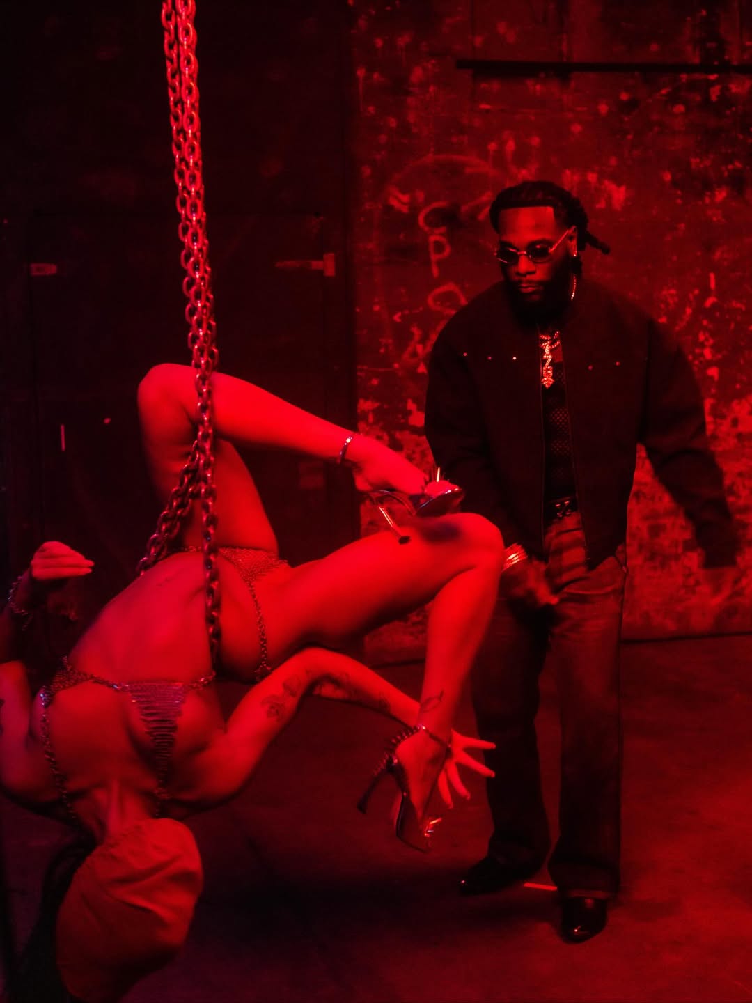 Burna Boy fires back at detractors complaining he kicked out sleepy couple