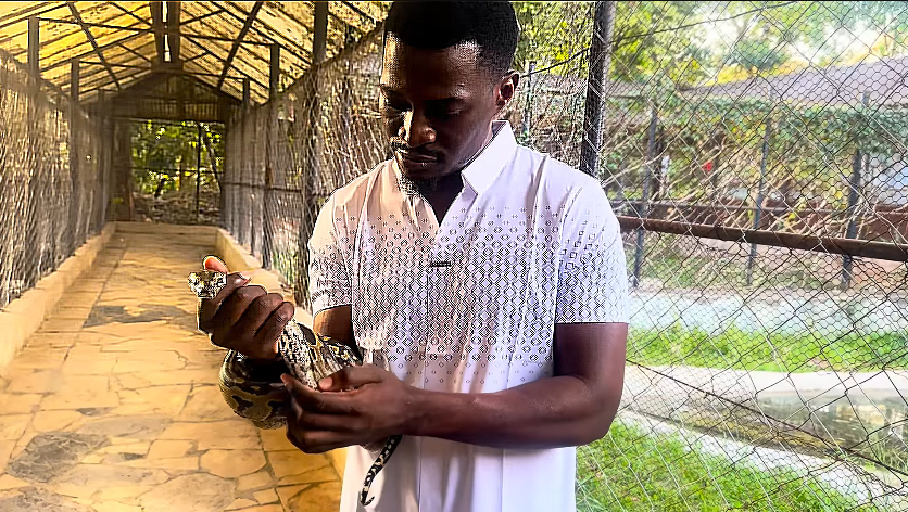 Tanzanian influencer Chief Godlove reveals his source of money is a snake