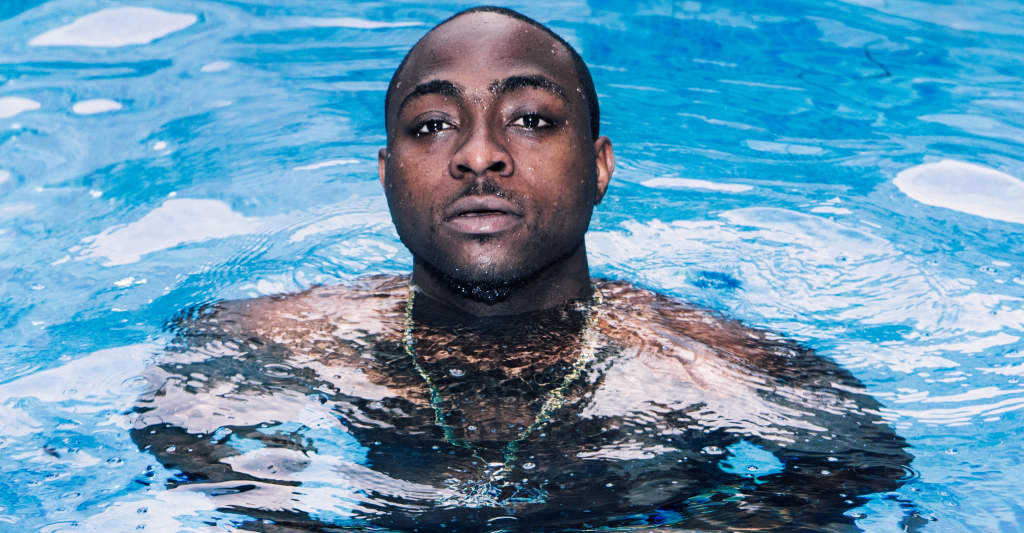 “Just Shut Up”- Davido Tells Irate Follower, Burna Boy Responds