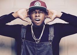 Runtown adds to the tattoo on his body and this time its a gun