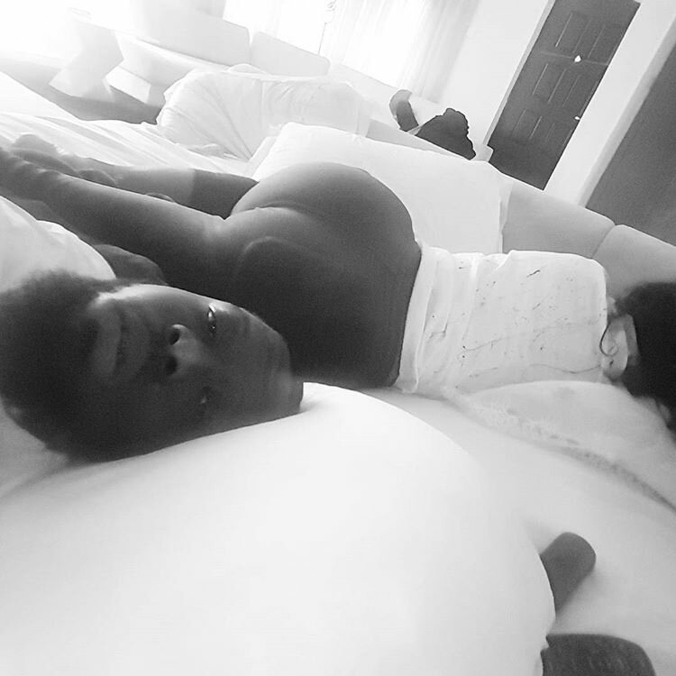 Timaya playing daddy duties as he dances with his son Emmanuel