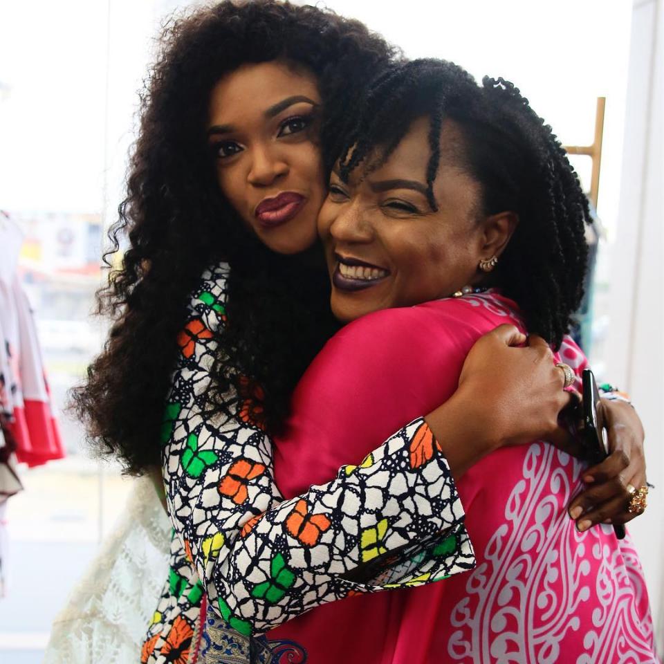 Photos of Chioma Chukwuka and Omoni Oboli Kissing a Dolphin