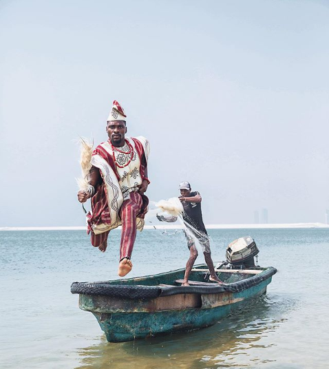 Caption this photo of Tobi Bakre in aso-oke