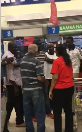 Drama at Nakumatt City Kisumu as Rowdy Indian lady is Thrashed like a Burukenge for calling a Luo Man’s wife a female dog
