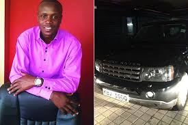 Chris Obure poses for a photot