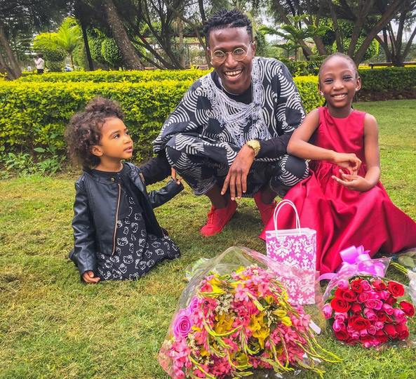 Octopizzo with his daughters