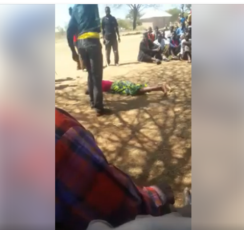 This Shocking video of Luhya elders caning a woman in broad daylight will blow your mind Away! It’s going viral!