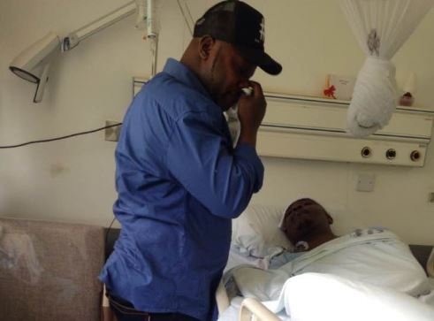 Kidum reduced to tears while visiting bedridden Big Kev at Nairobi Hospital (Video)