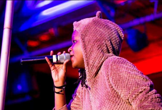 Fena performing her latest song