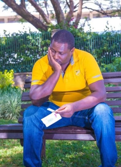 Why some men carry their wives handbags