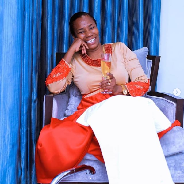 Mama Dangote makes comeback to trolls of nagging romantic photo-shoots with Rally Jones