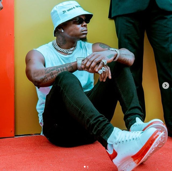 A fan creates a scene after attacking Harmonize on stage