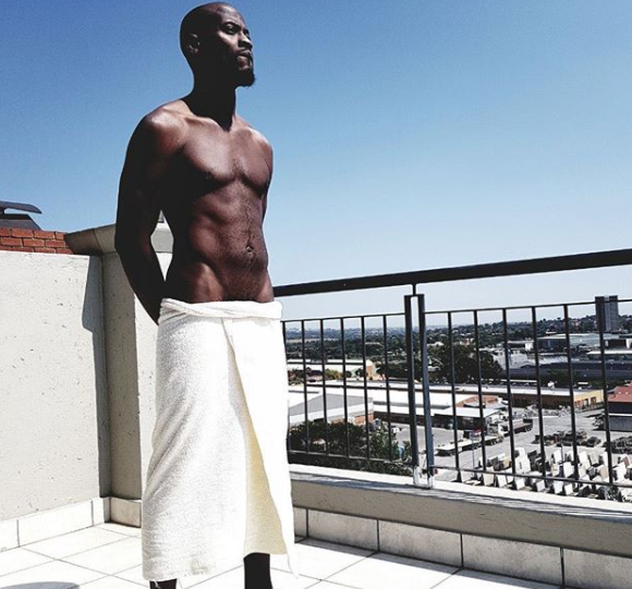 Sexy photos of Moe Amusa in a towel