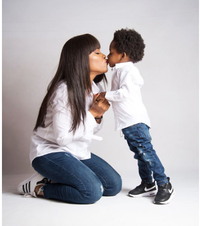 Photos of Maje Aiyida’s baby mama, Anita Solomon and her son