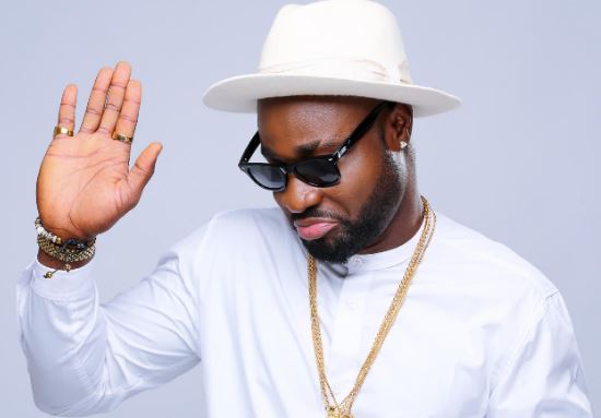 Totin Lawani Gives Half Naked Harrysong a Full Body Massage