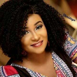 Actress, Doris Simeon Spends Summer Vacation with Only Child, in the US