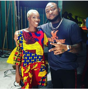 Tribal mark face model Adetutu meets with Davido