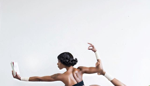 Michelle Okoro puts butt on display in a yoga pose